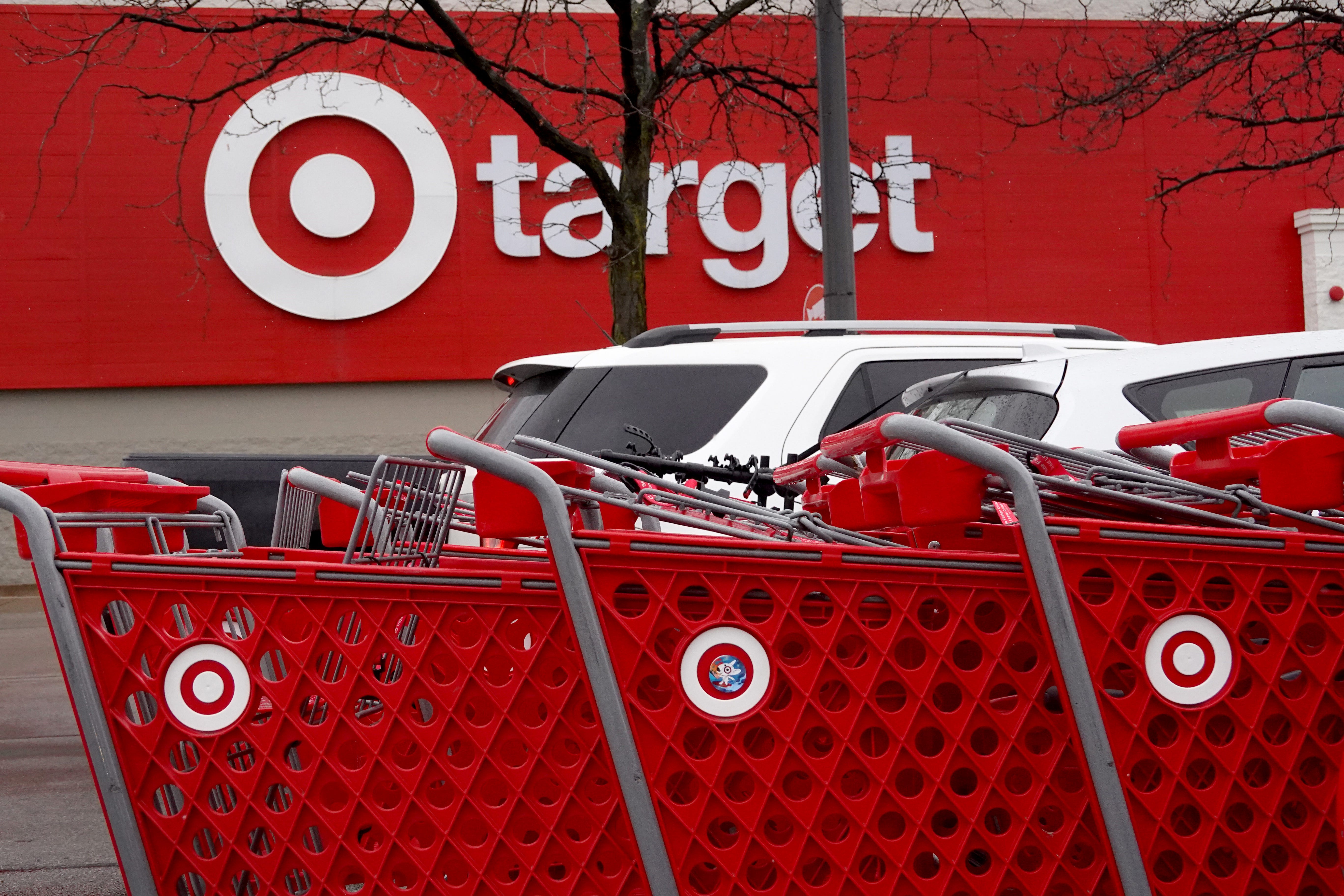 Shopping carts are lined up outside of a Target store on November 16, 2022 in Chicago, Illinois.