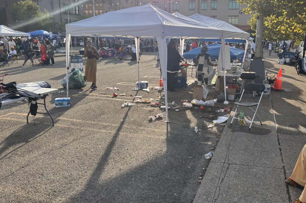 Litter and vendor booths at a festival.