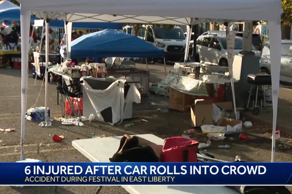 Aftermath of a car crash at a festival in East Liberty, six injured.