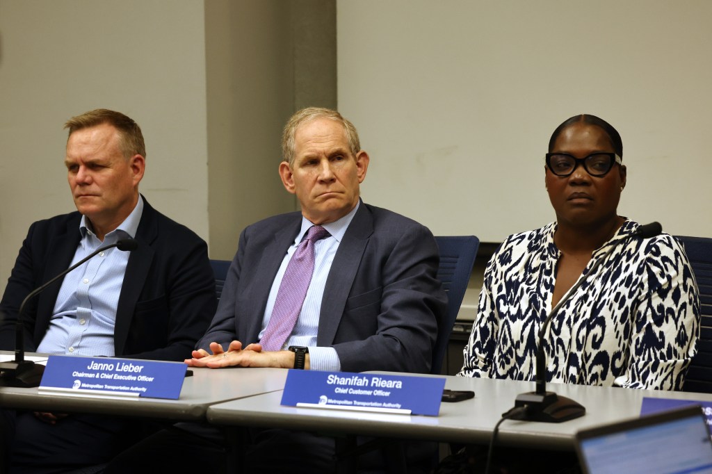 MTA officials at a public hearing on proposed fare increases.