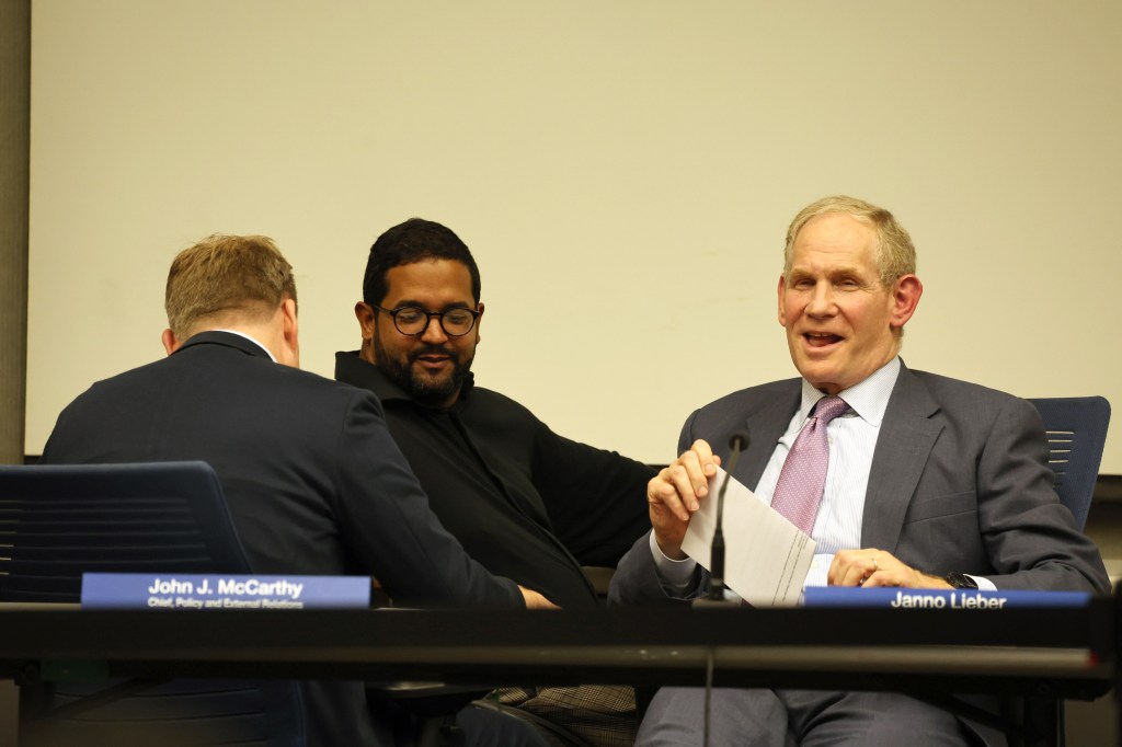 MTA officials John J. McCarthy, Quemuel Arroyo, and Janno Lieber at a public hearing.
