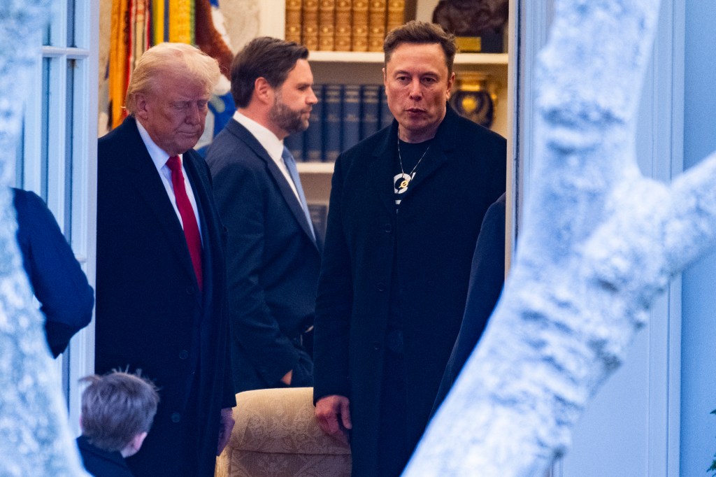 US Vice President JD Vance (C) exits the Oval Office in the opposite direction as US President Donald Trump and Elon Musk (R) walk away before departing the White House on his way to his South Florida home in Mar-a-Lago in Florida on March 14, 2025.
