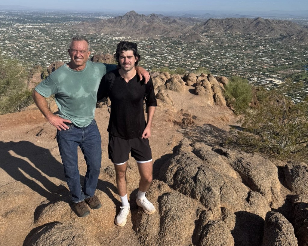 Robert F. Kennedy Jr. and his son Finn hiking on Camelback Mountain.
