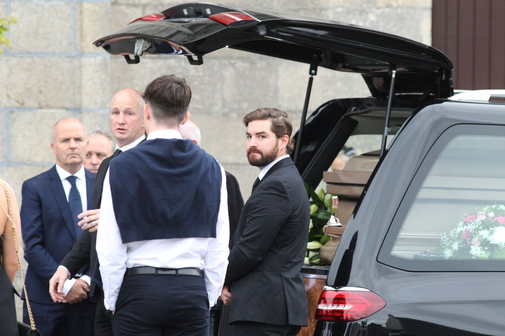 Mourners at Martha Nolan's funeral.