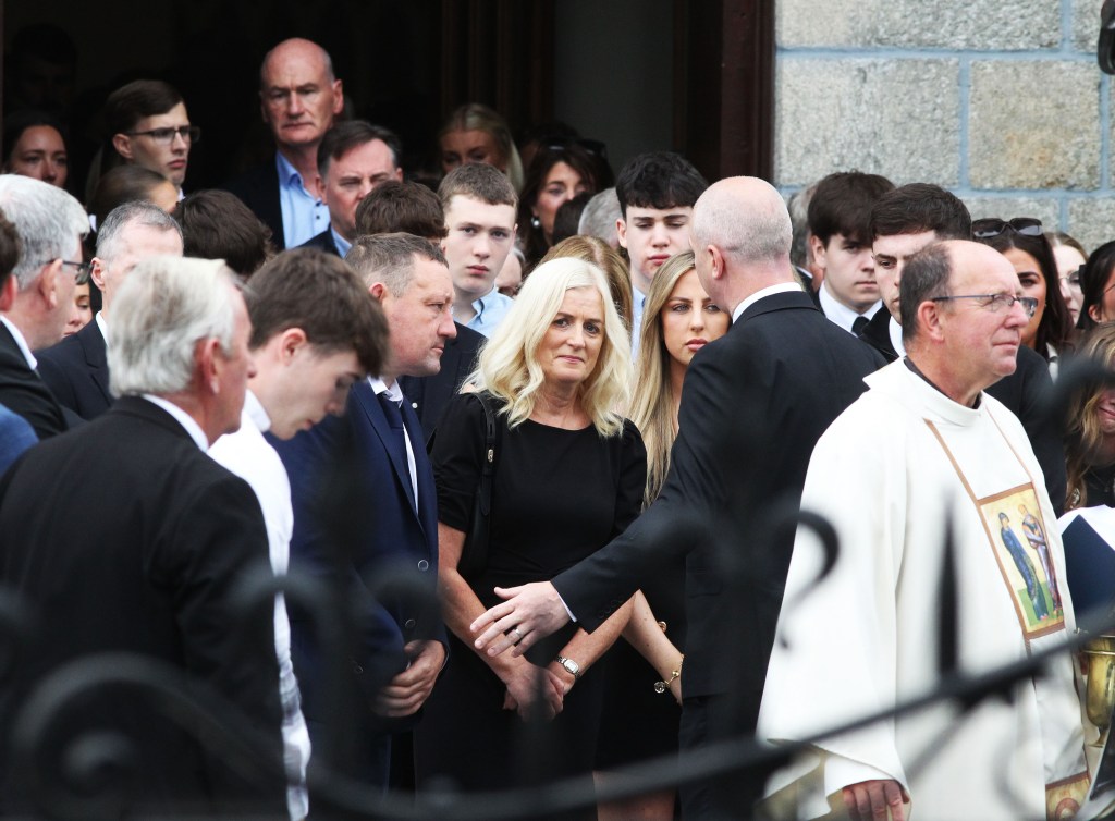 Mourners at Martha Nolan's funeral.