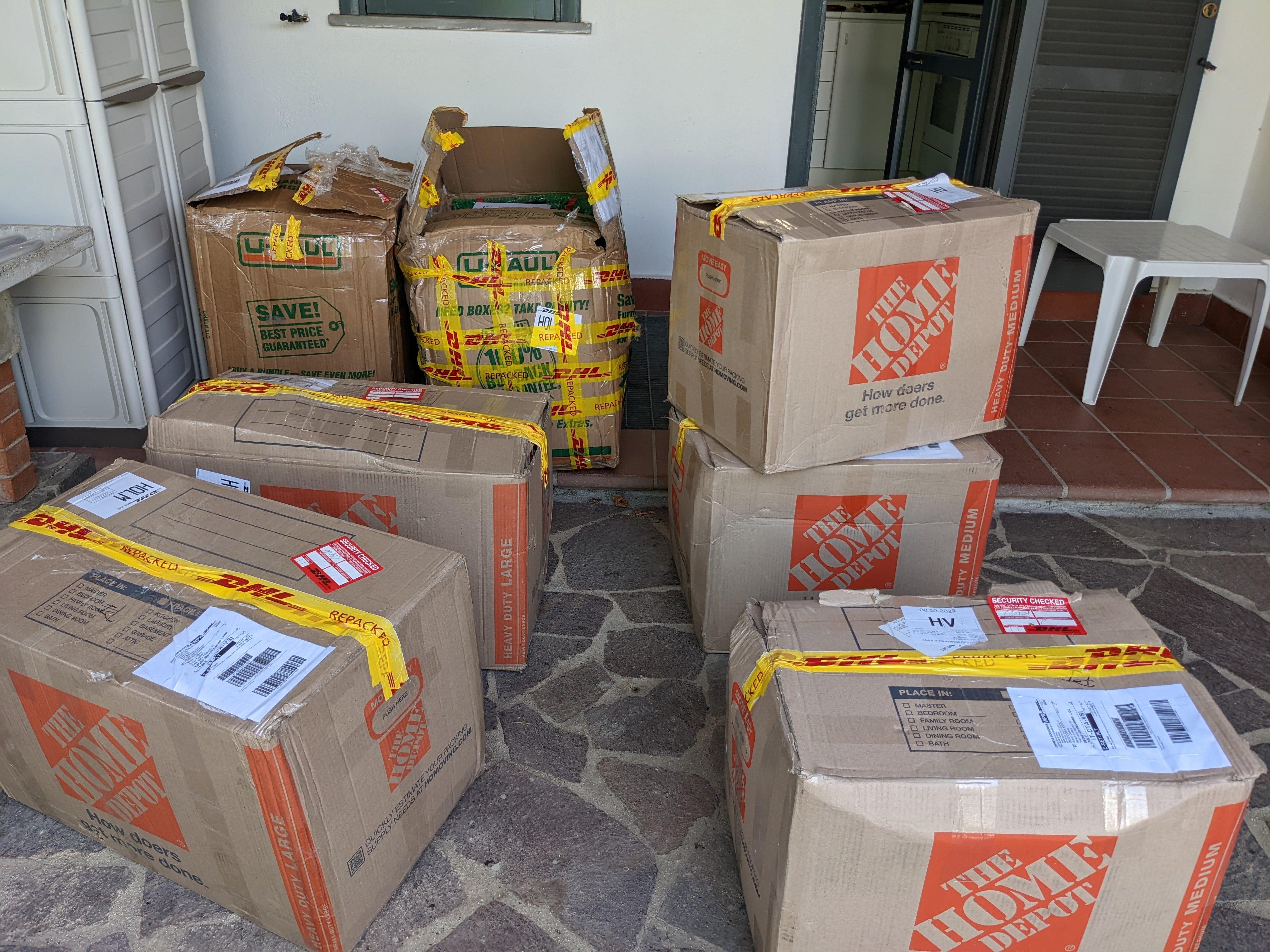 Seven brown moving boxes from Home Depot.