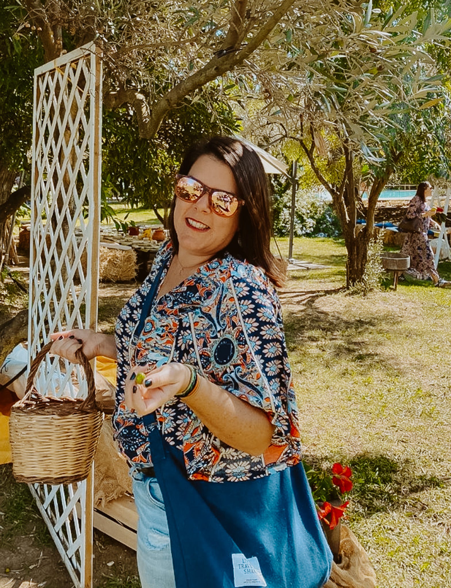 Woman picking olives in Italy.