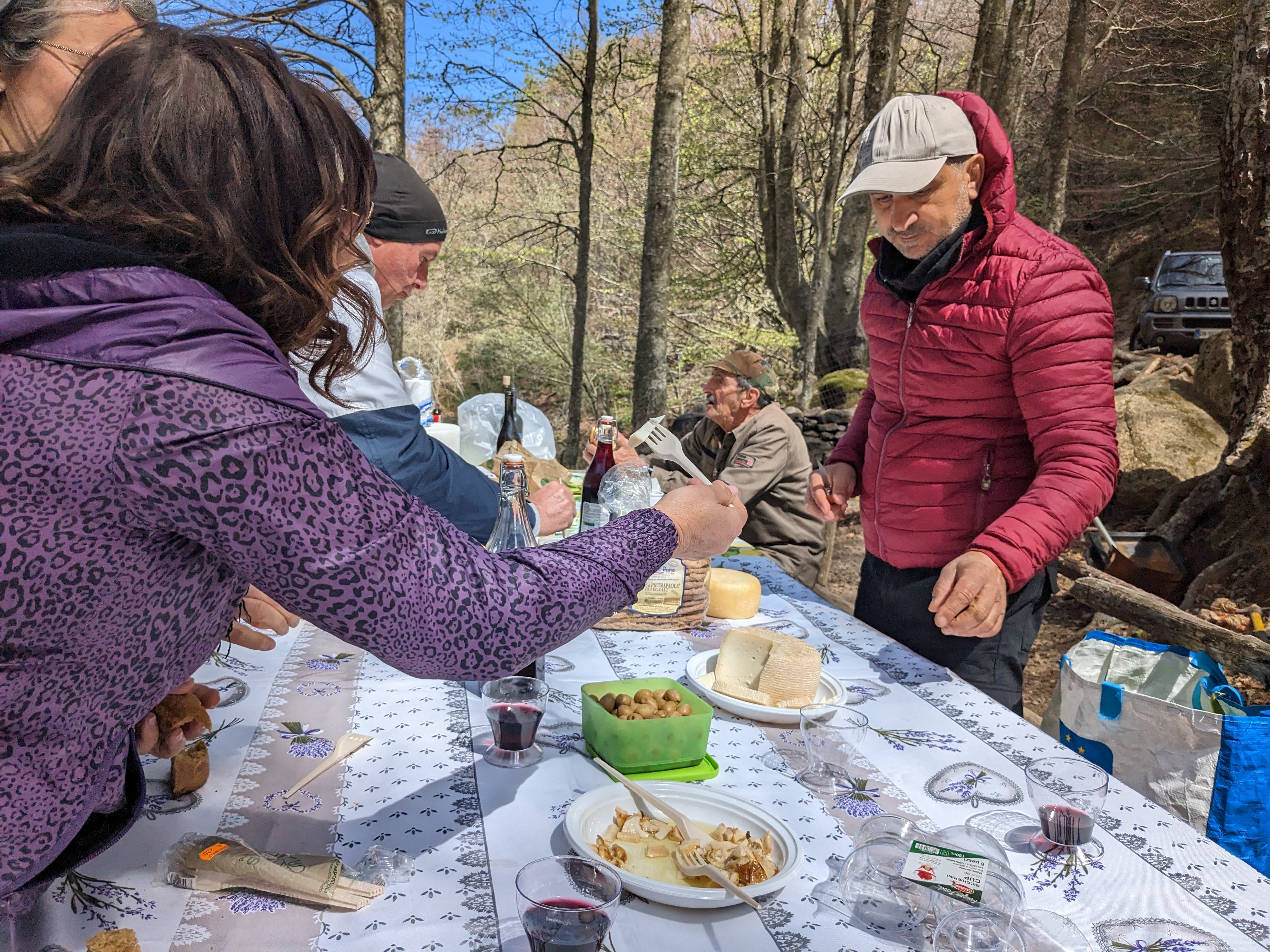 people at a table full of food