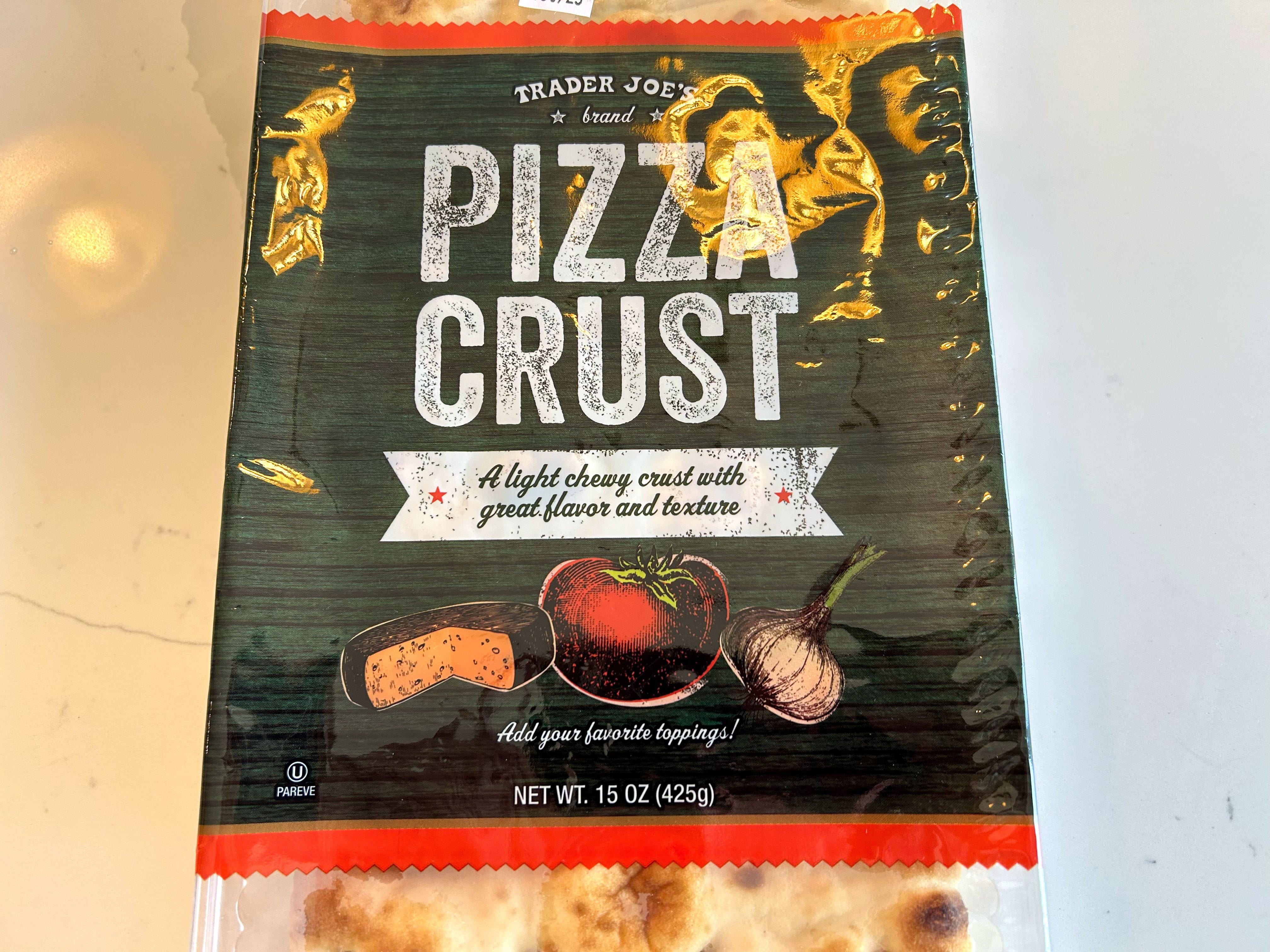 A container of Trader Joe's pizza crust.