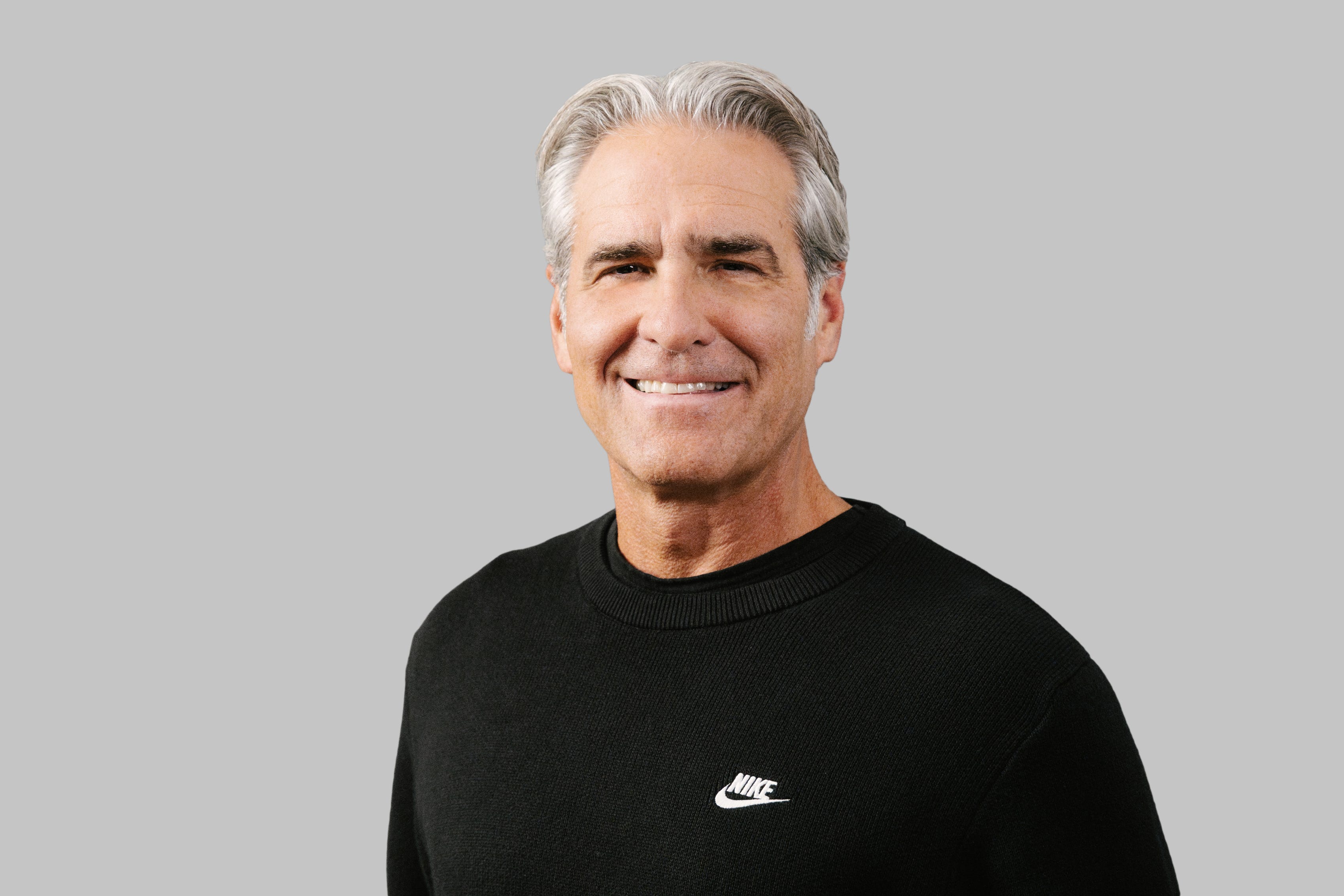 Incoming Nike President & CEO Elliott Hill wears a black Nike shirt