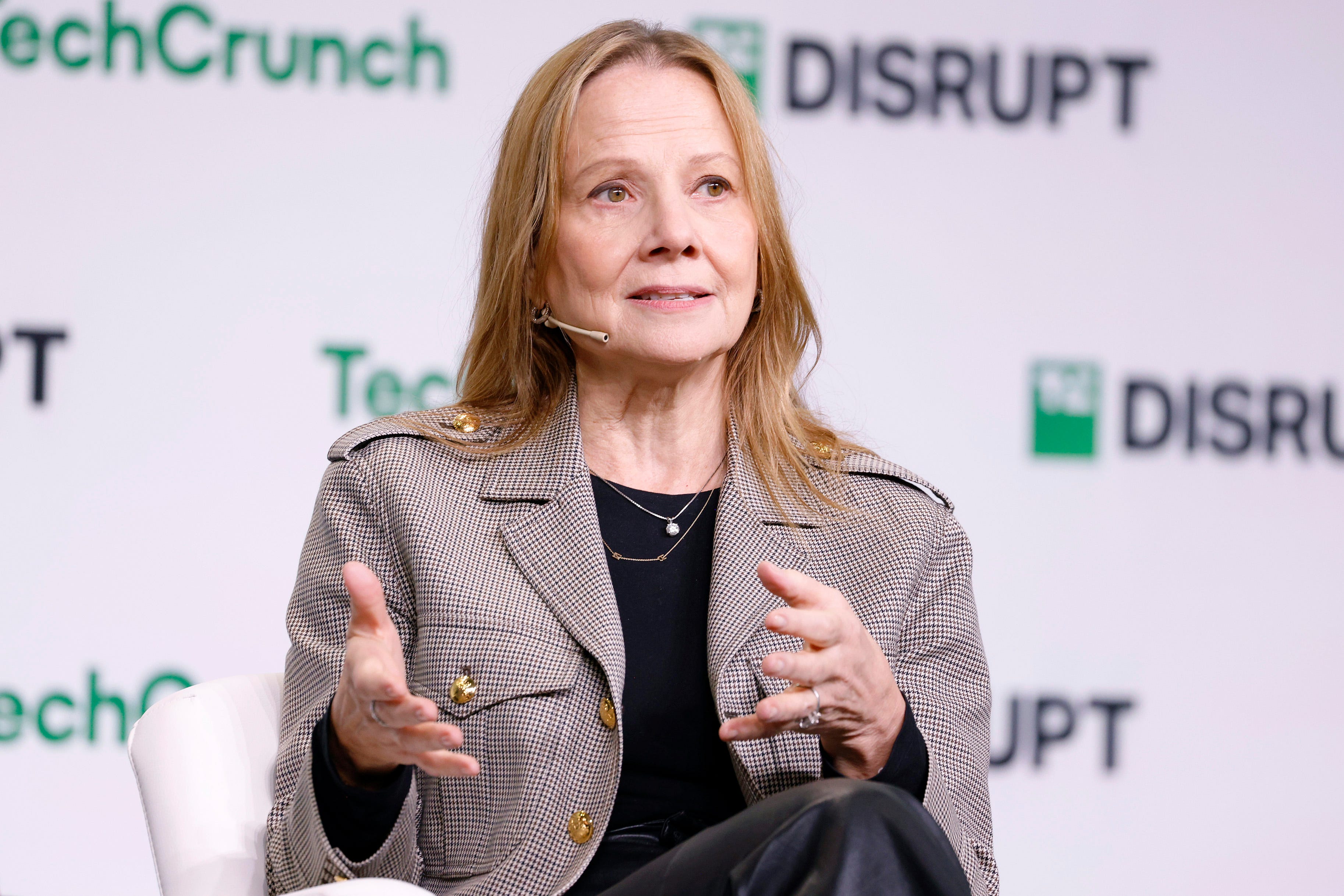 Mary Barra sits on stage