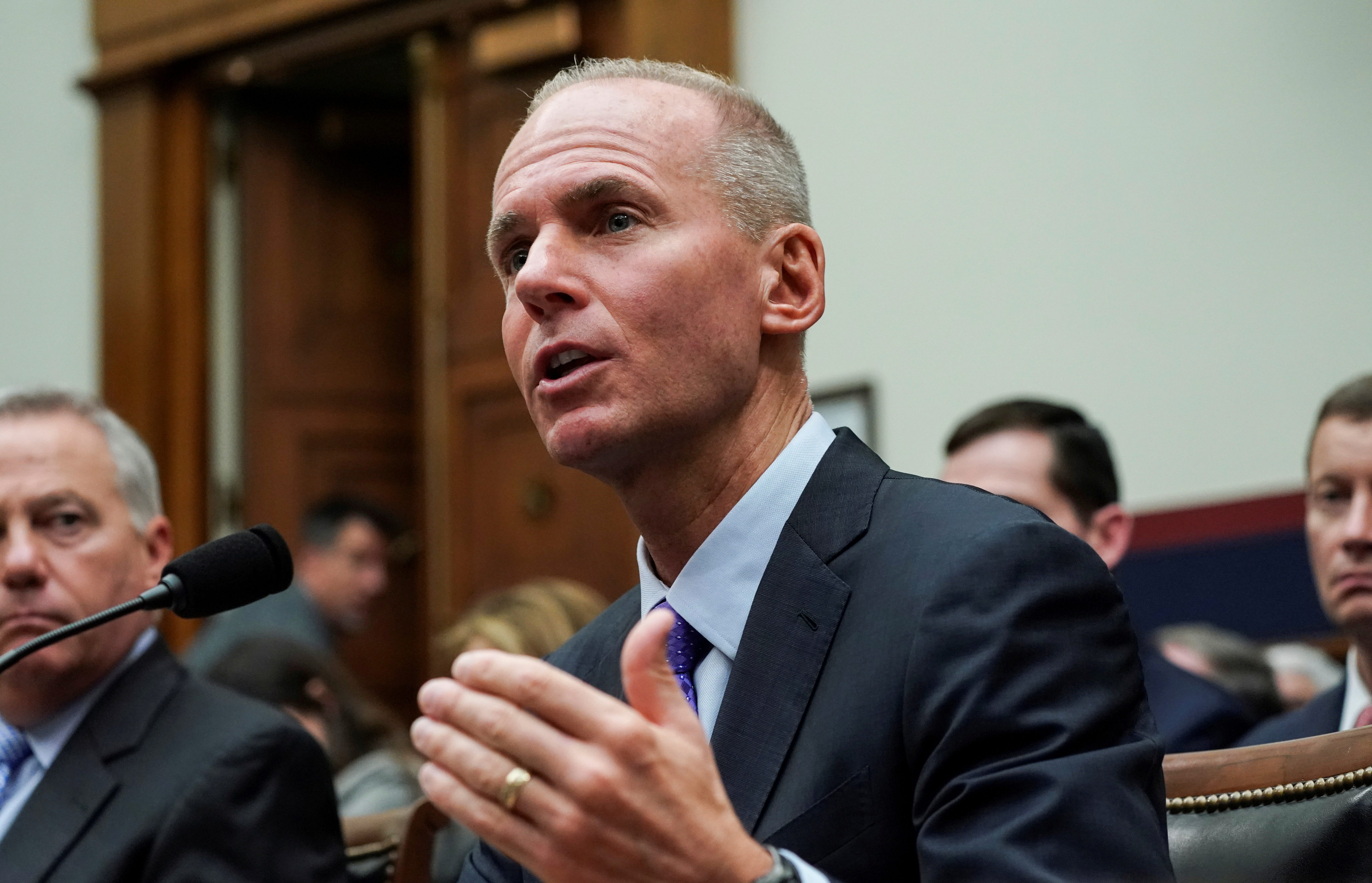 FILE PHOTO: Boeing Chief Executive Dennis Muilenburg testifies before the House Transportation and Infrastructure Committee during a hearing on the grounded 737 MAX in the wake of deadly crashes, on Capitol Hill in Washington, U.S., October 30, 2019. REUTERS/Sarah Silbiger