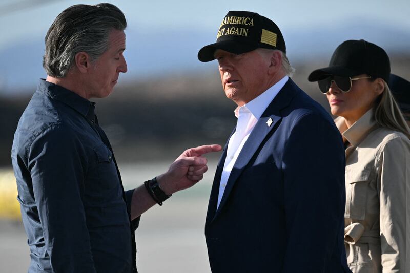 US President Donald Trump and First Lady Melania Trump are greeted by California Governor Gavin Newsom upon arrival at Los Angeles International Airport in Los Angeles, California, on January 24, 2025.