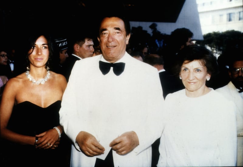 Media proprietor and fraudster, Robert Maxwell (1923 - 1991) at a party on his yacht with daughter Ghislaine and wife Elisabeth  (1921 - 2013) circa 1990.
