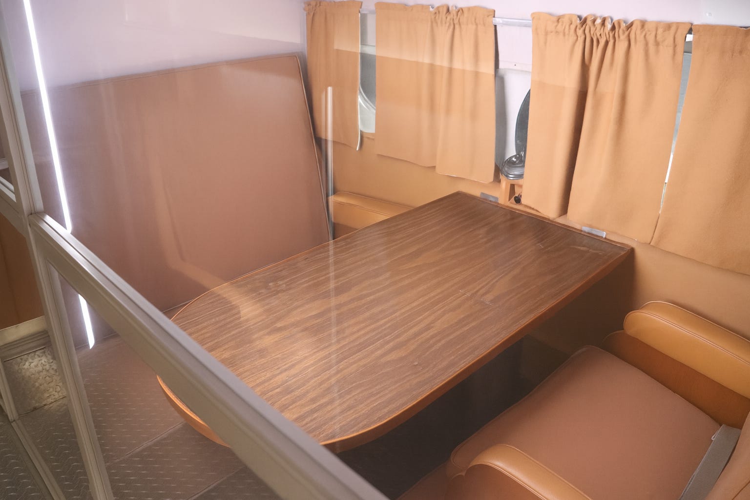 A small conference area on board the Sacred Cow.
