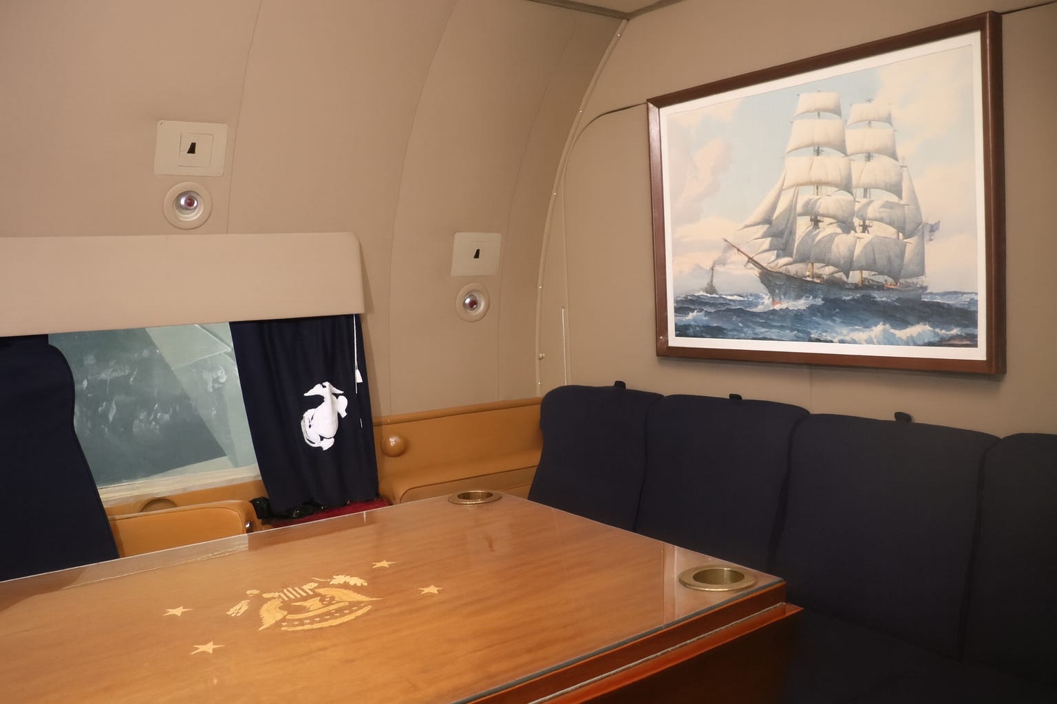 The executive conference room on board the Sacred Cow.