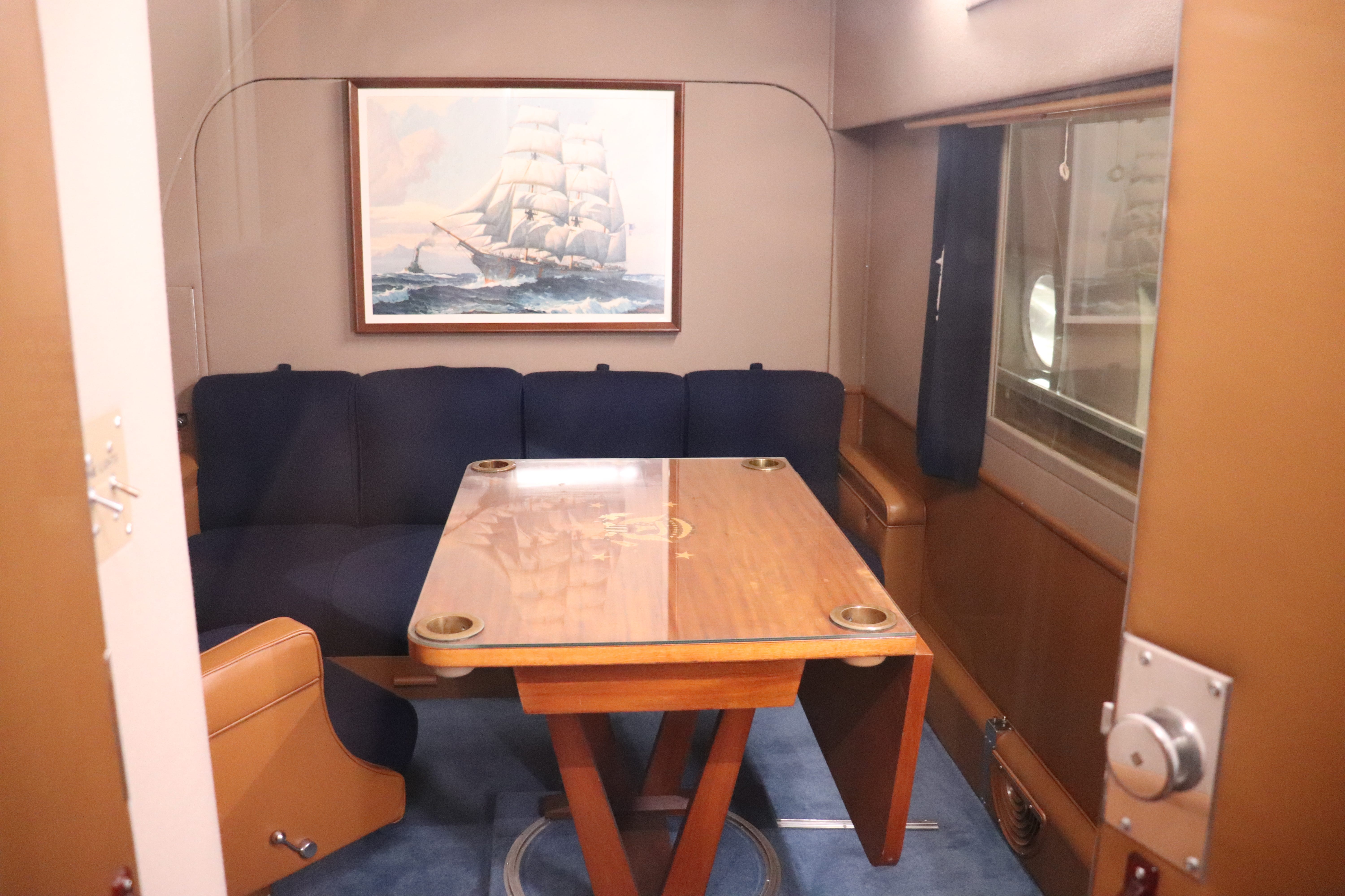 The executive conference room on board the Sacred Cow.