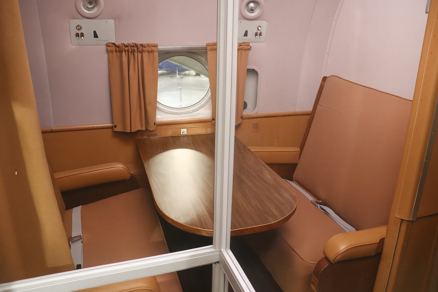 A conference room on board the Sacred Cow.