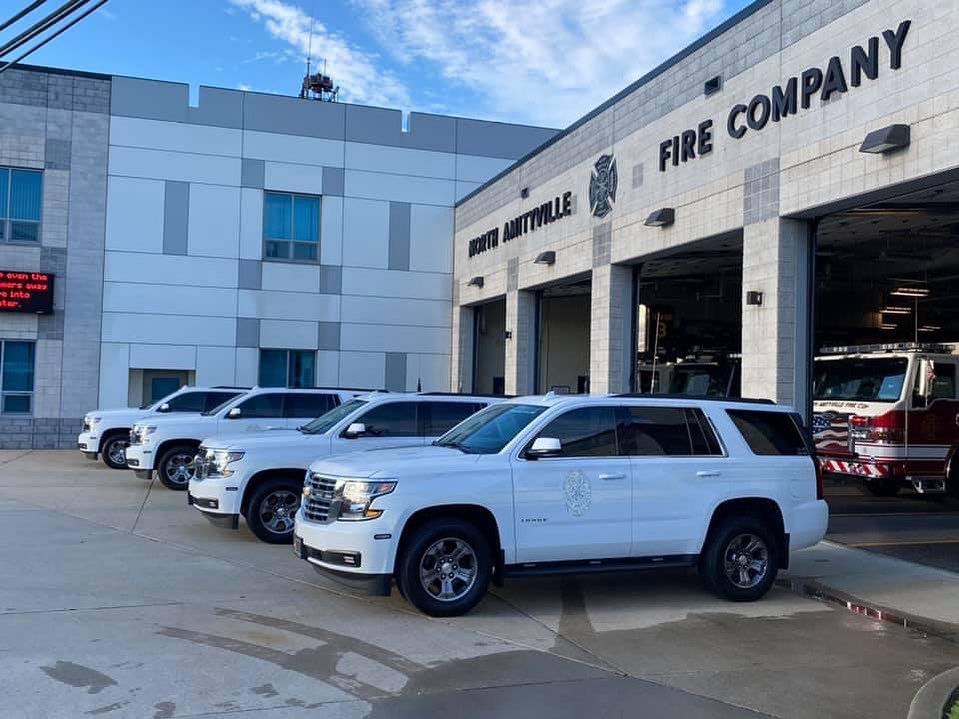 North Amityville Fire Company vehicles parked in front of the fire station.