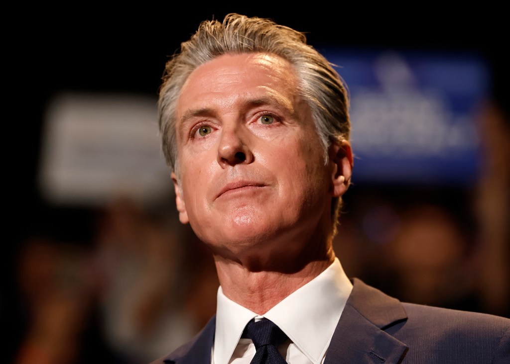 Photo of Gavin Newsom speaking at a press conference.