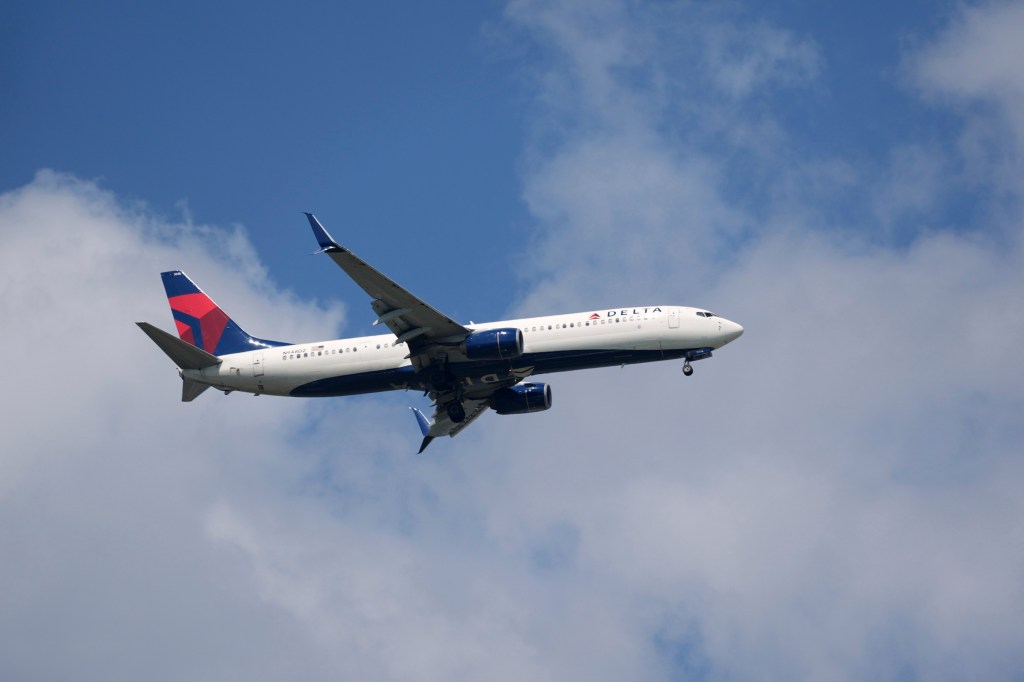 Delta Airlines plane in flight.