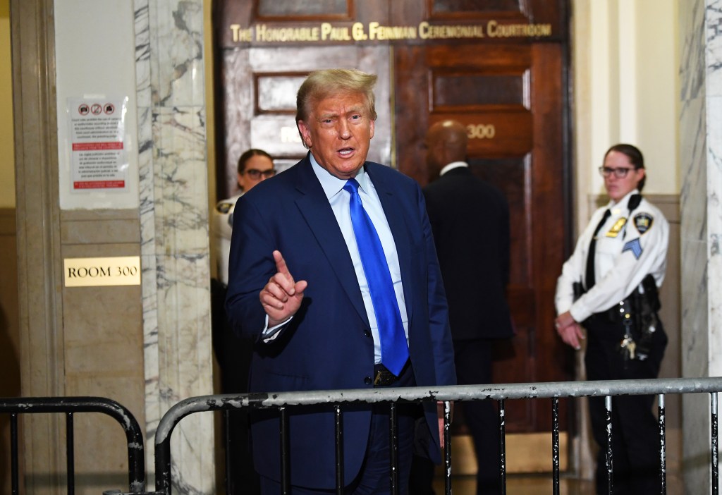 Donald Trump speaking outside a courtroom.