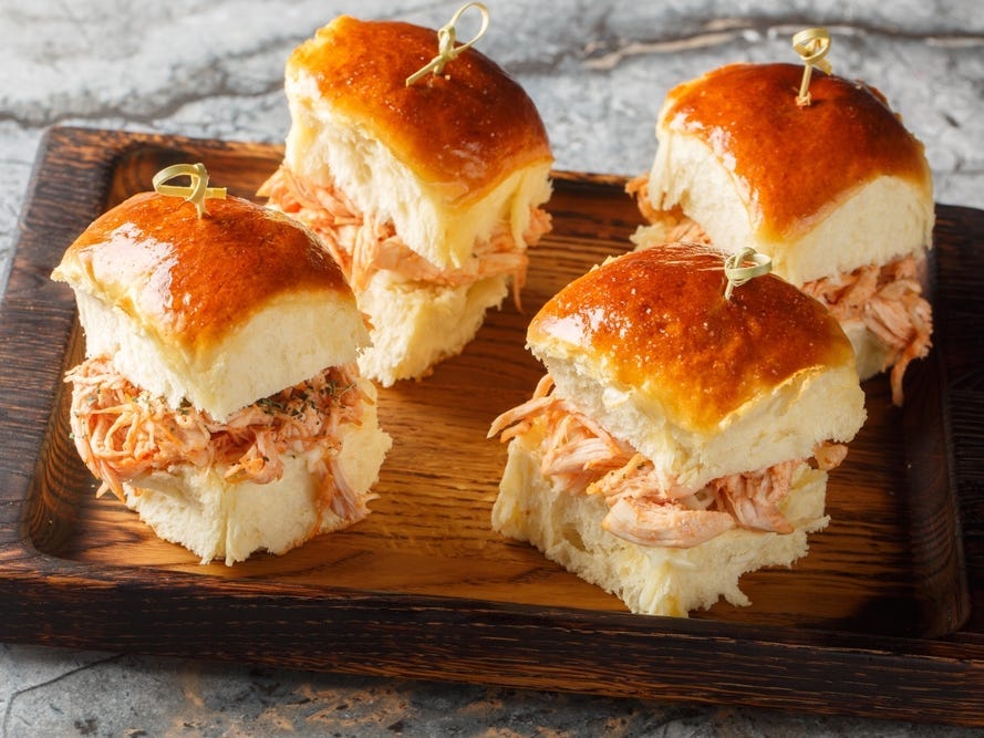 Chicken cheese sliders roll made with pulled chicken, tomato sauce, and Mozzarella