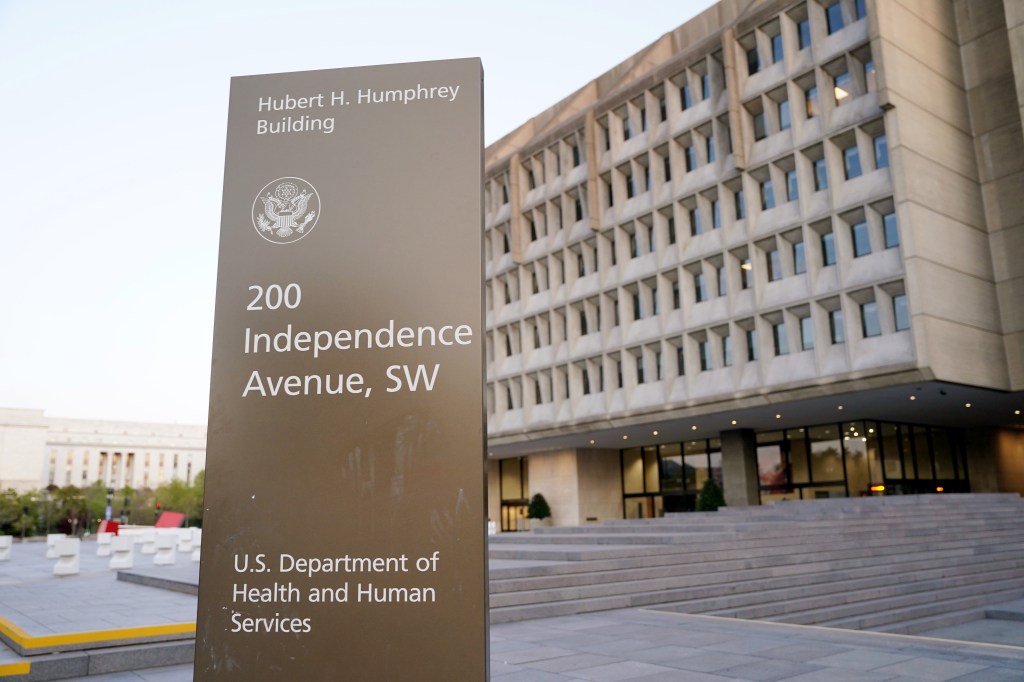 U.S. Department of Health and Human Services building sign and building.