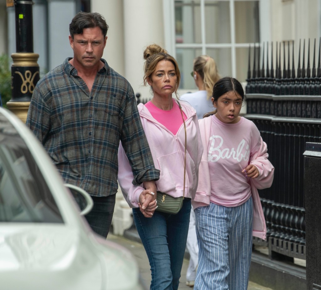Aaron Phypers holding hands with Denise Richards with daughter Eloise.