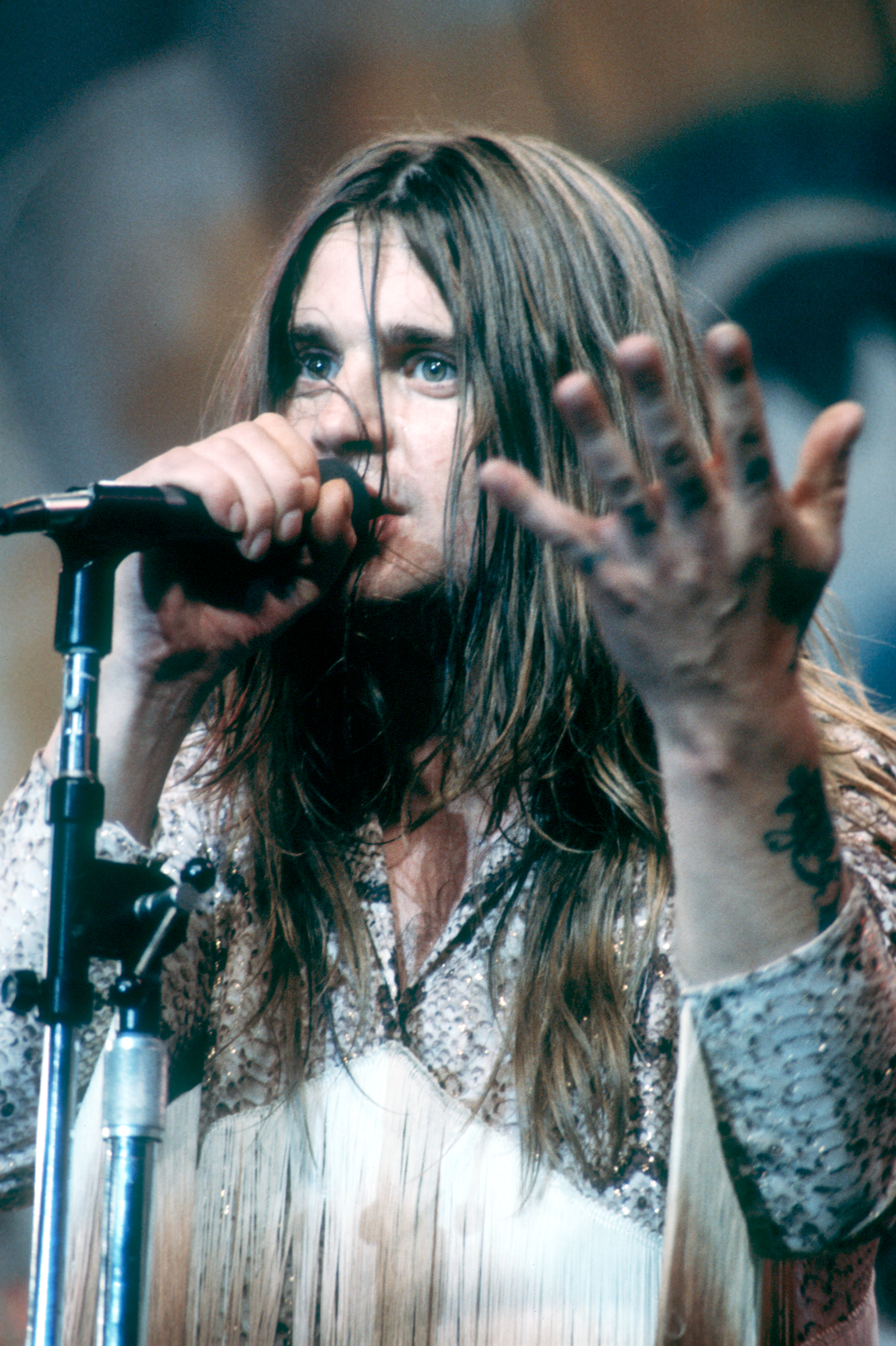 Ozzy Osbourne performing in a throwback photo. 