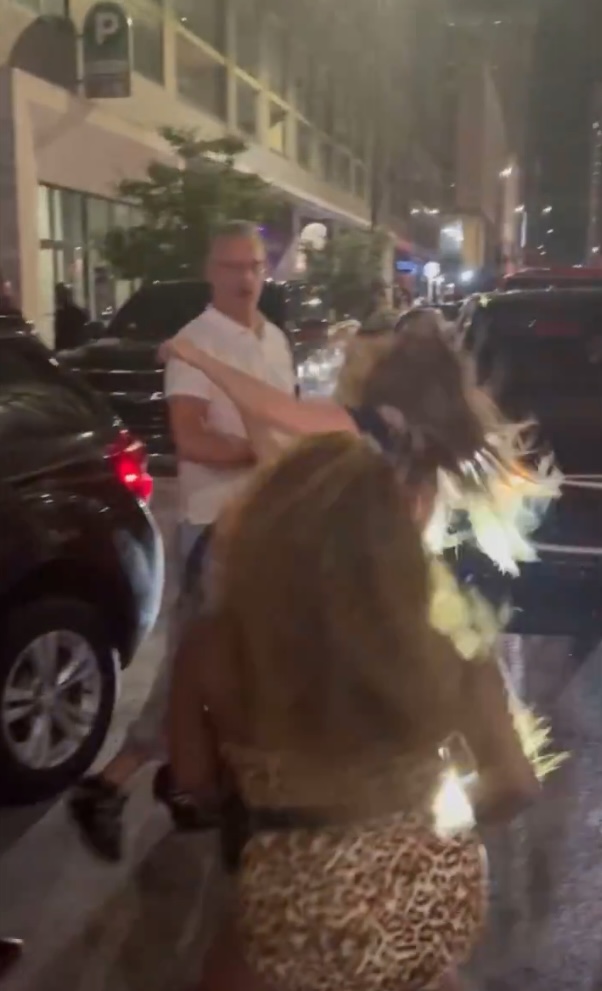 A video still of a brawl in downtown Cincinnati.