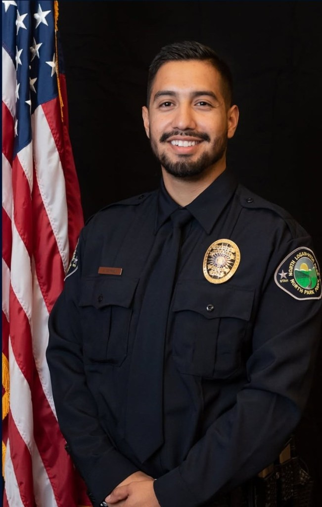 Portrait of slain Officer Eric Estrada.