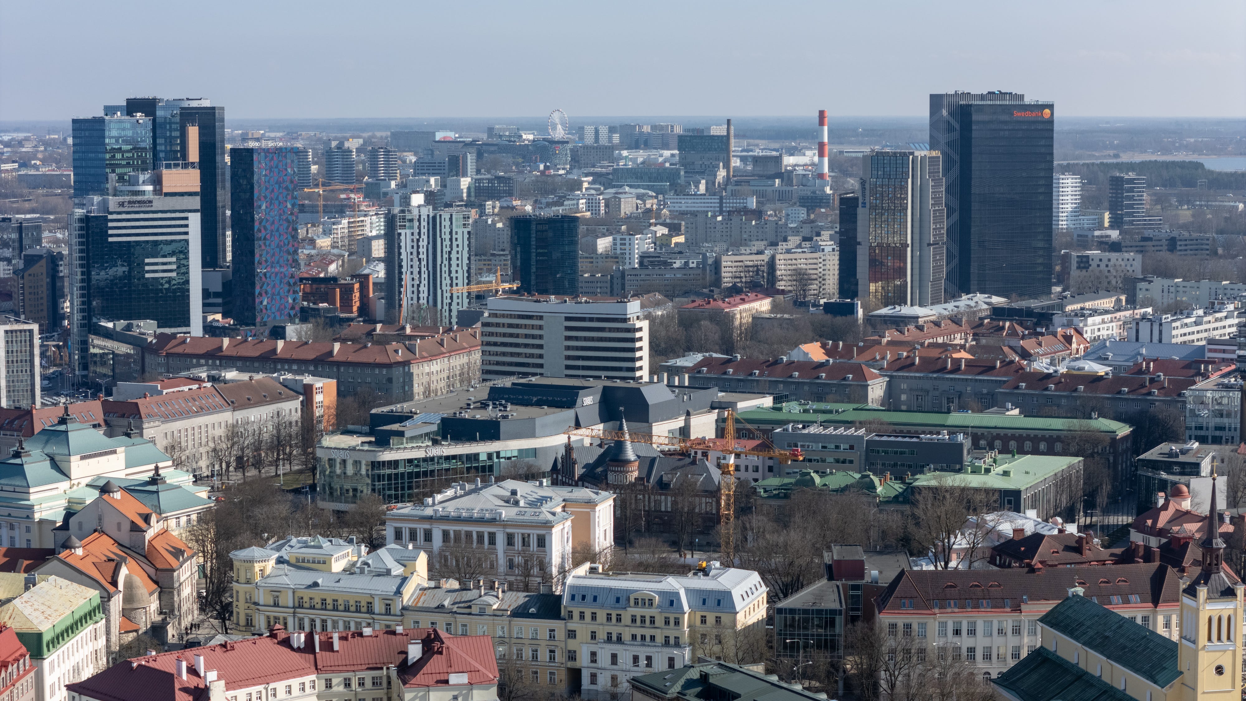 Drone view of the city center of Tallinn with its skyscrapers on April 1, 2025