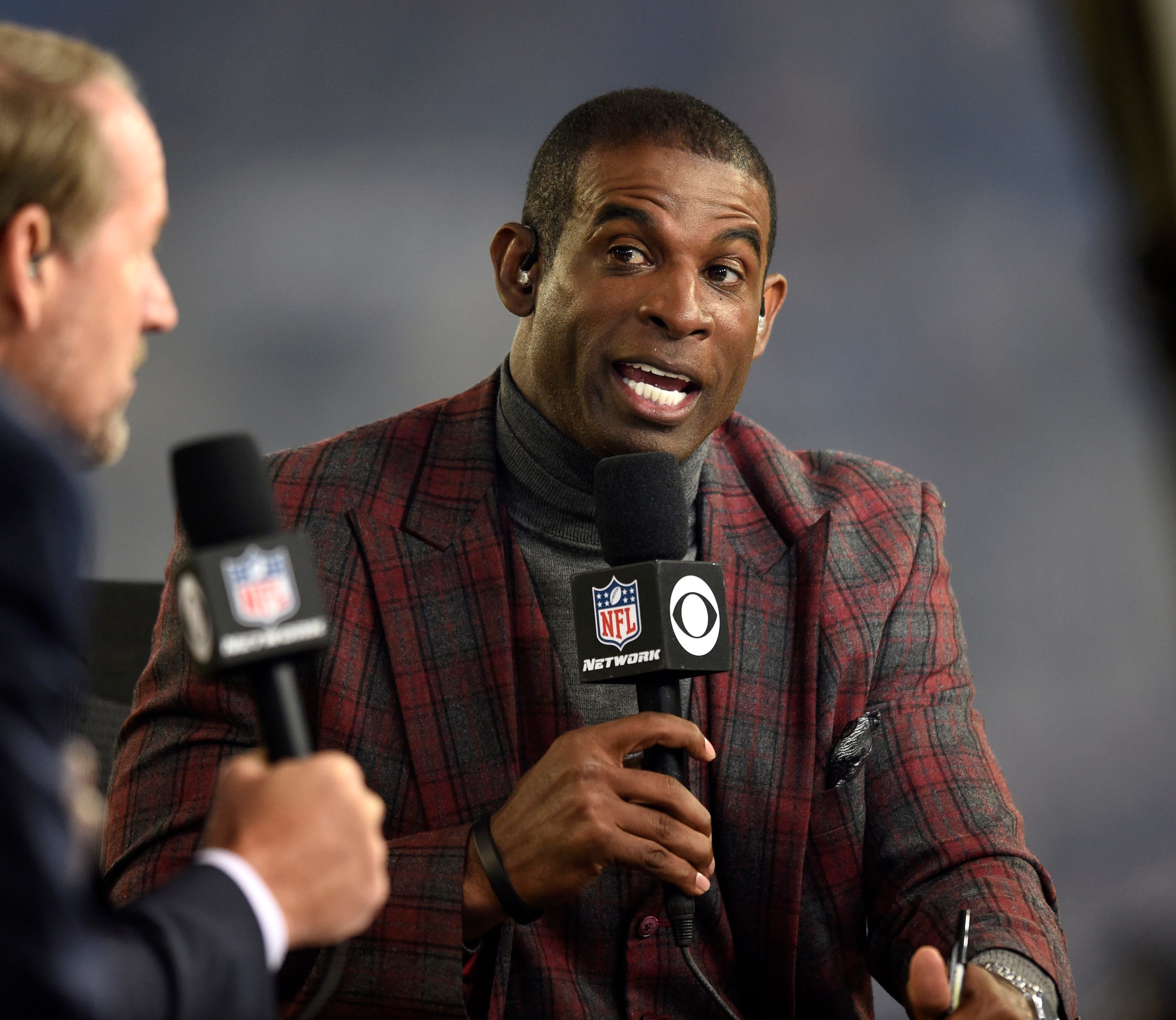 Deion Sanders speaks on a broadcast with the NFL Network.