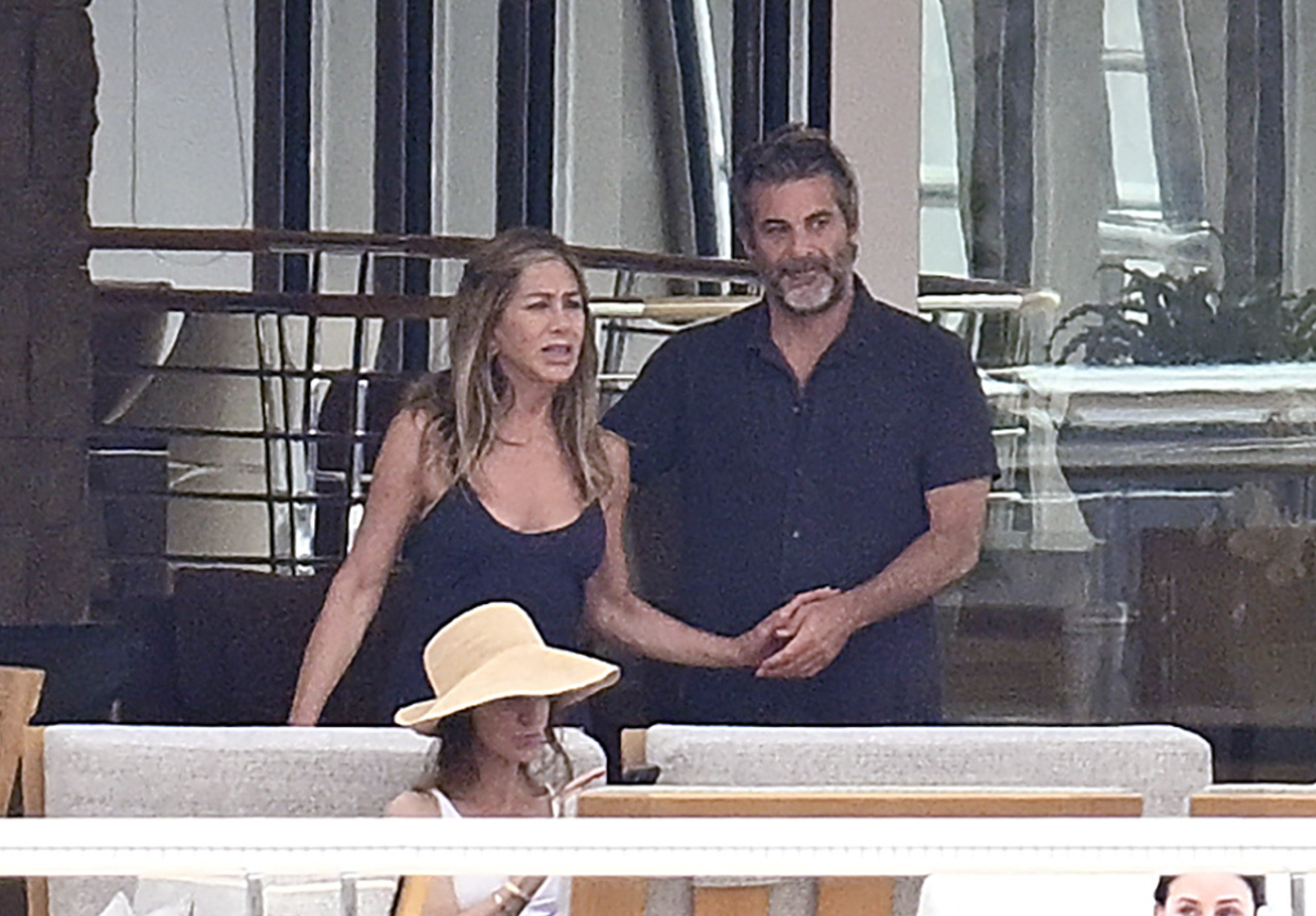 Jennifer Aniston and Jim Curtis.