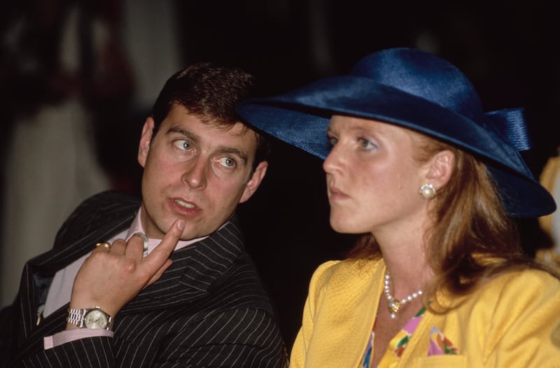 Sarah, Duchess of York and Prince Andrew watch a fashion show at the Royal York Hotel in Toronto, Canada, 17th July 1987.