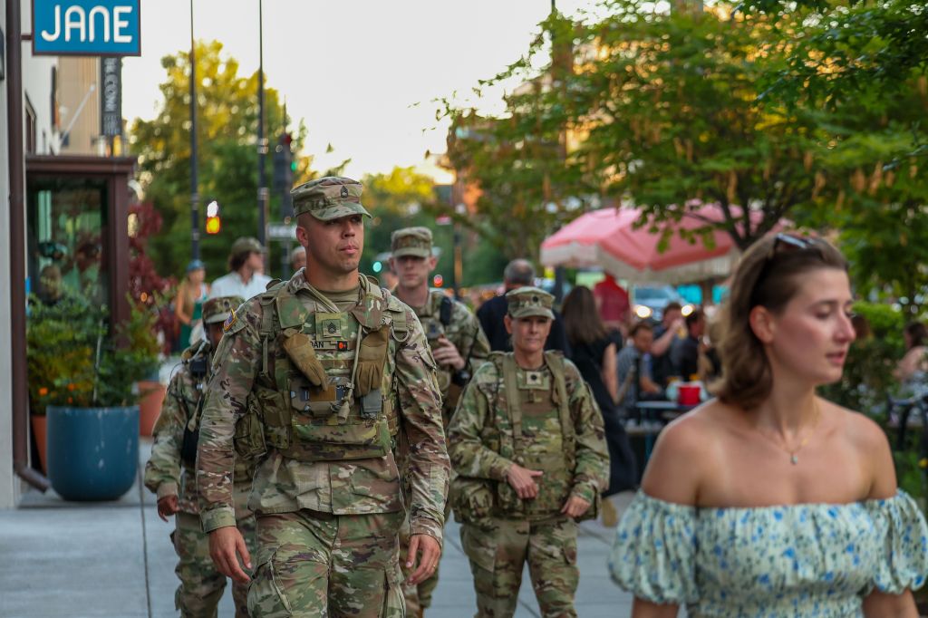 National Guard members patrol the 14 Street restaurant and nightlife area in Washington, DC, on Aug. 22, 2025.