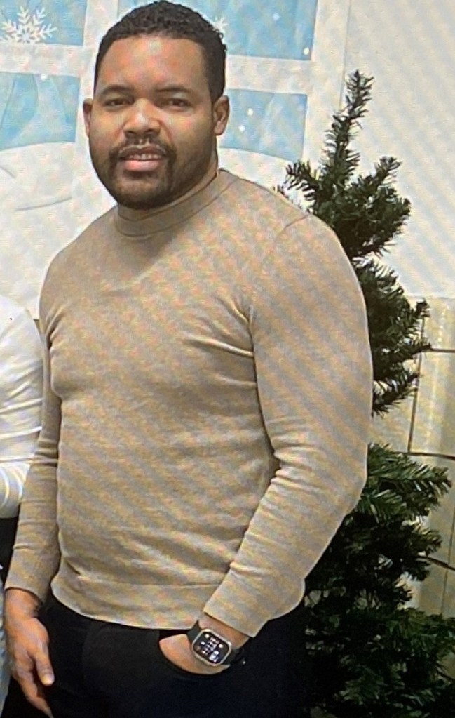 Photo of Alejandro F. Santos, a New York City teacher's aide.
