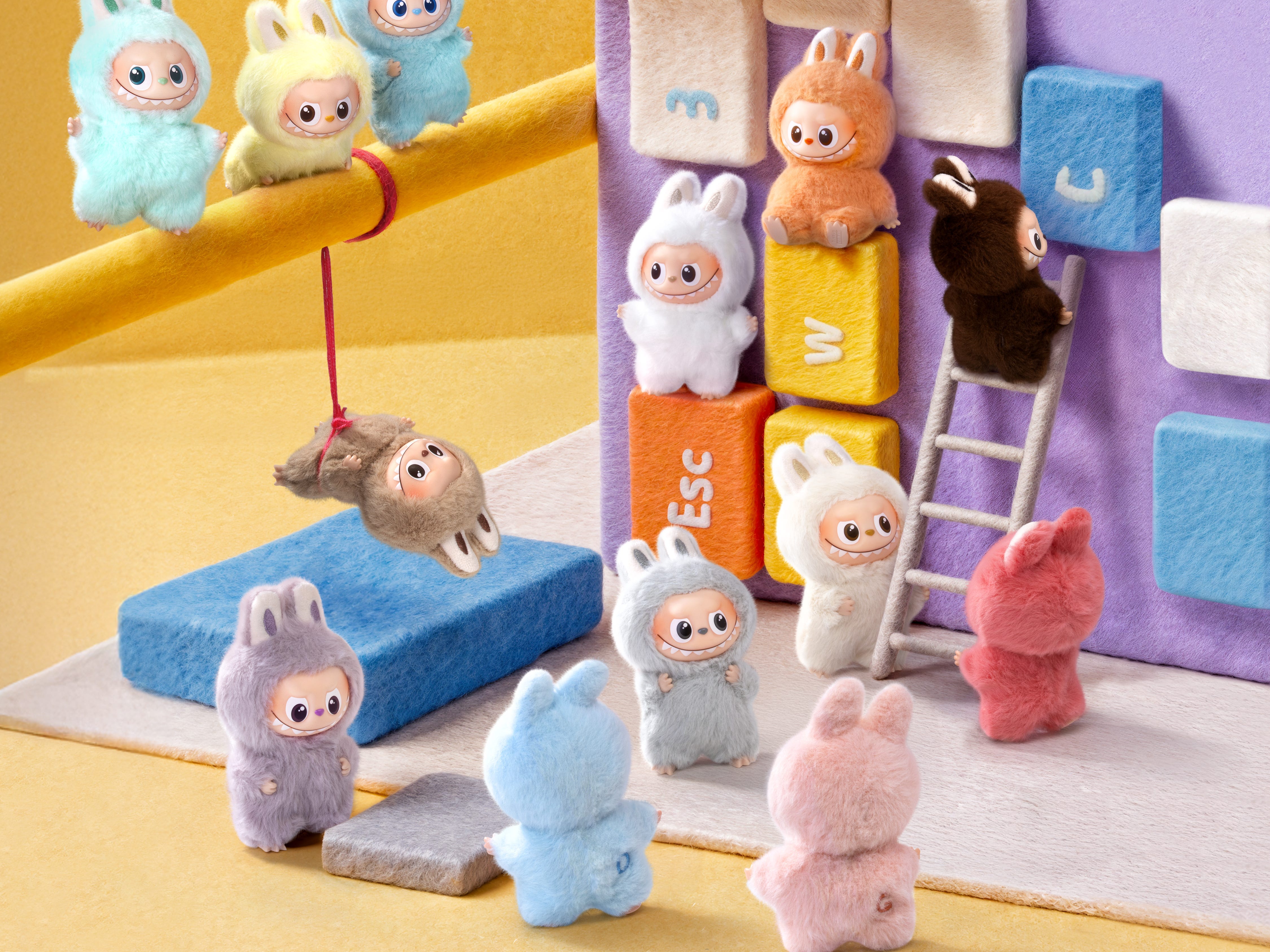 The mini Labubu dolls each have a letter stitched on their backs.