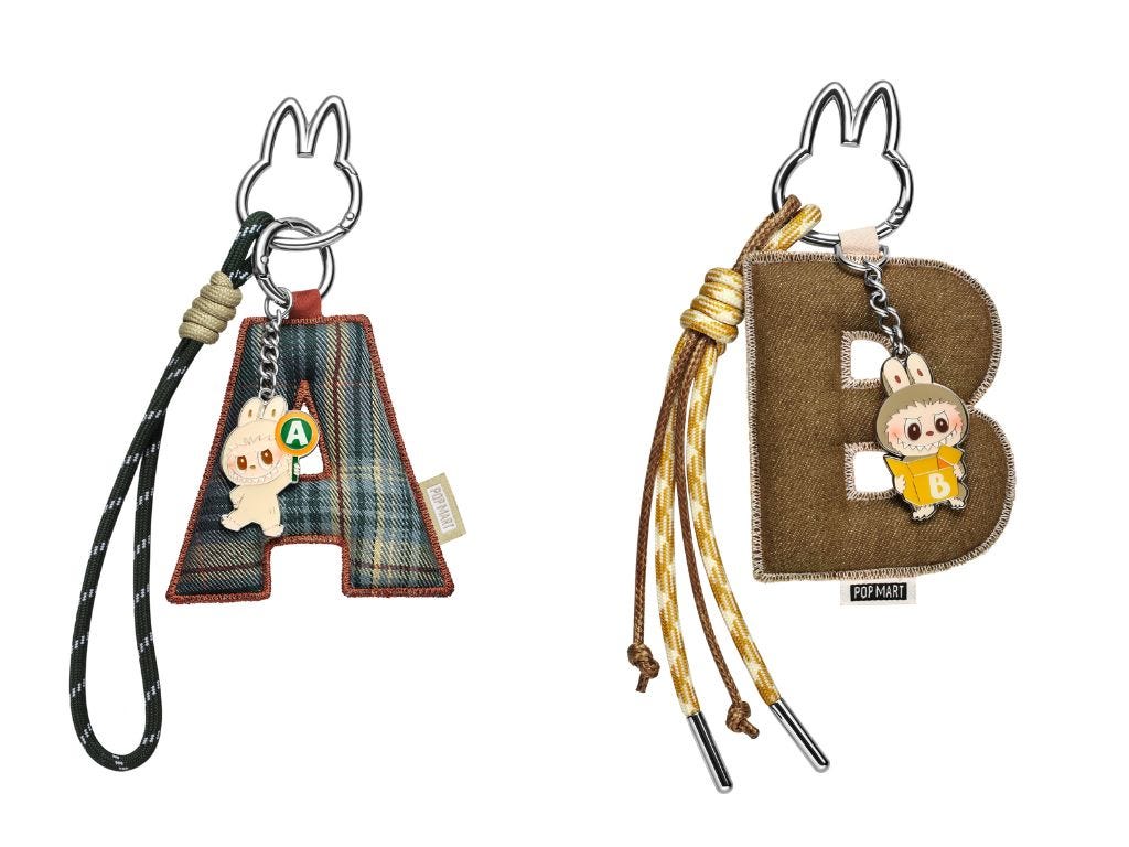 Pop Mart's letter pendants with Labubu metal charms.