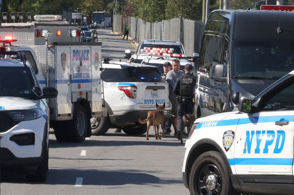 Showing NYPD at the crime scene at 143-01 22nd Road in Queens, NY. 