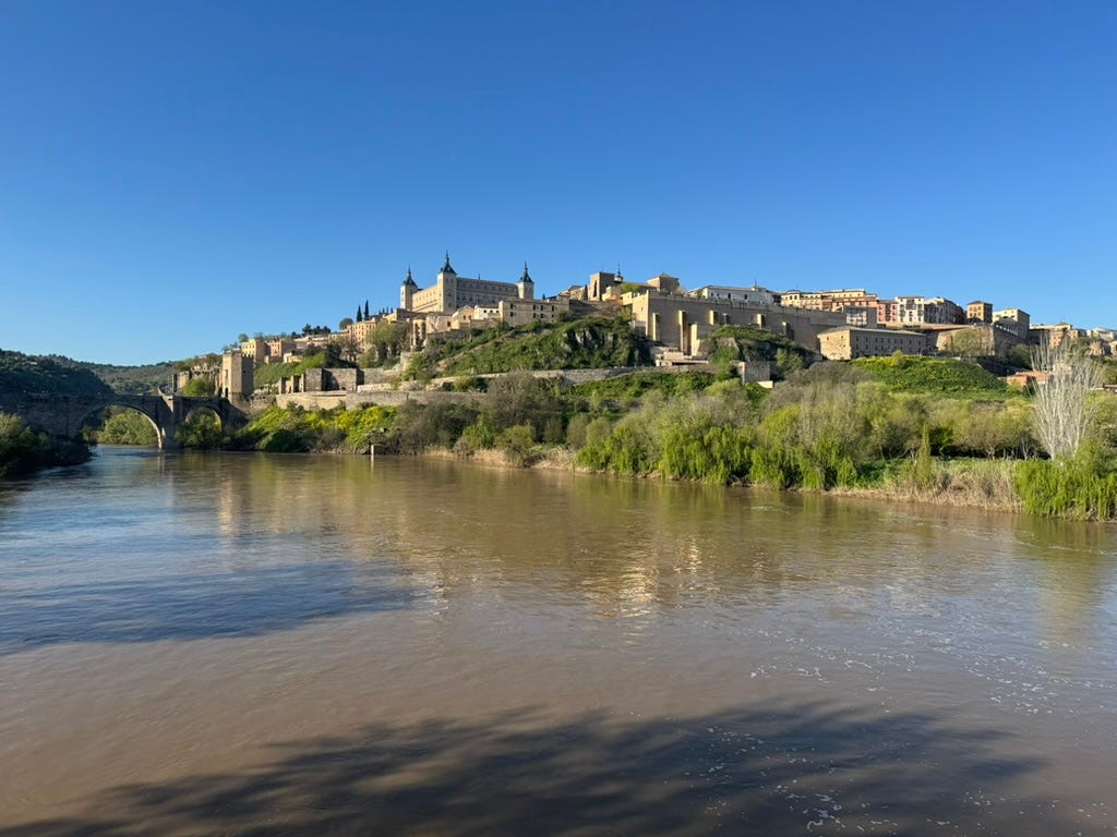 Spanish city with river in the foreground
