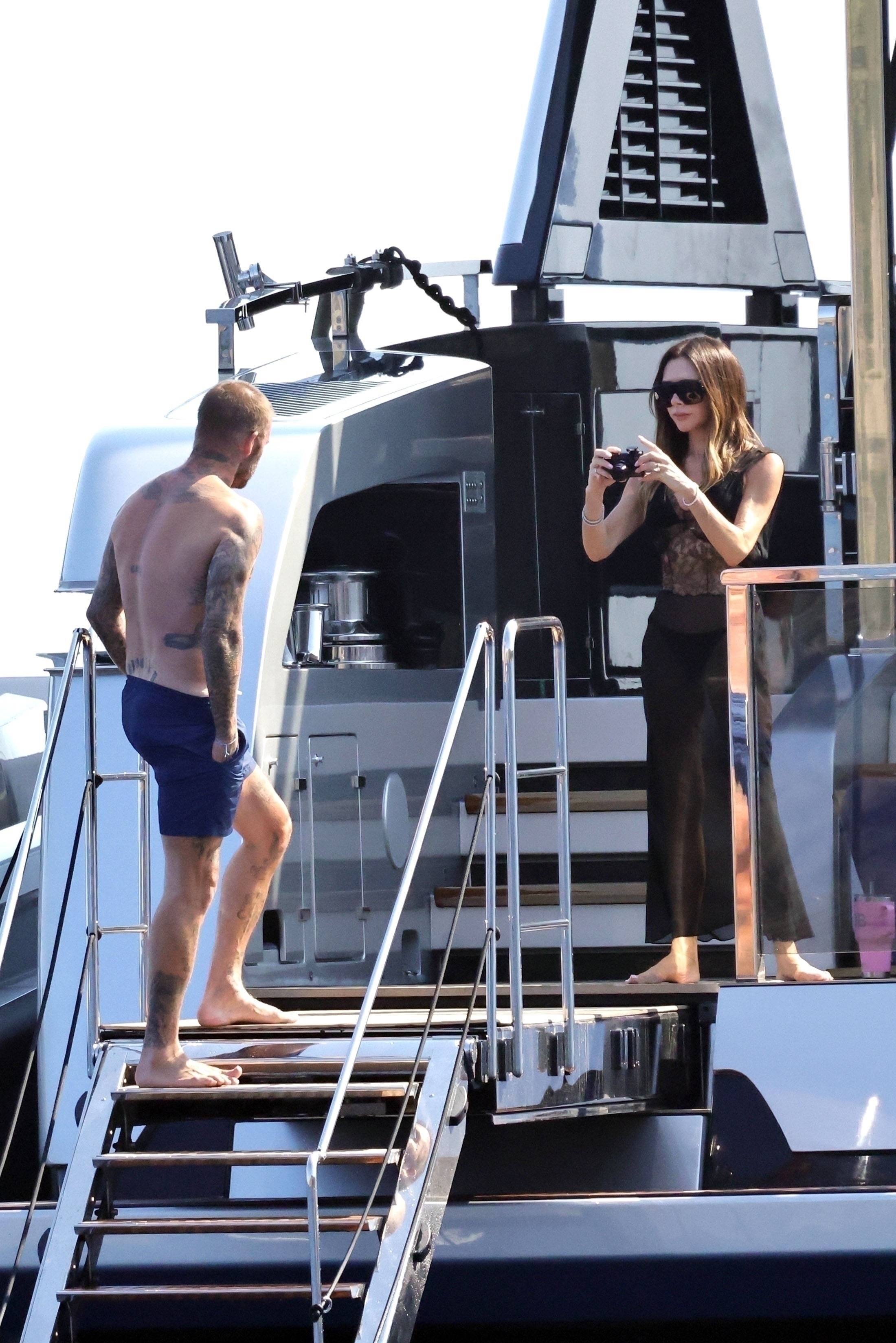 David Beckham and Victoria Beckham on a yacht