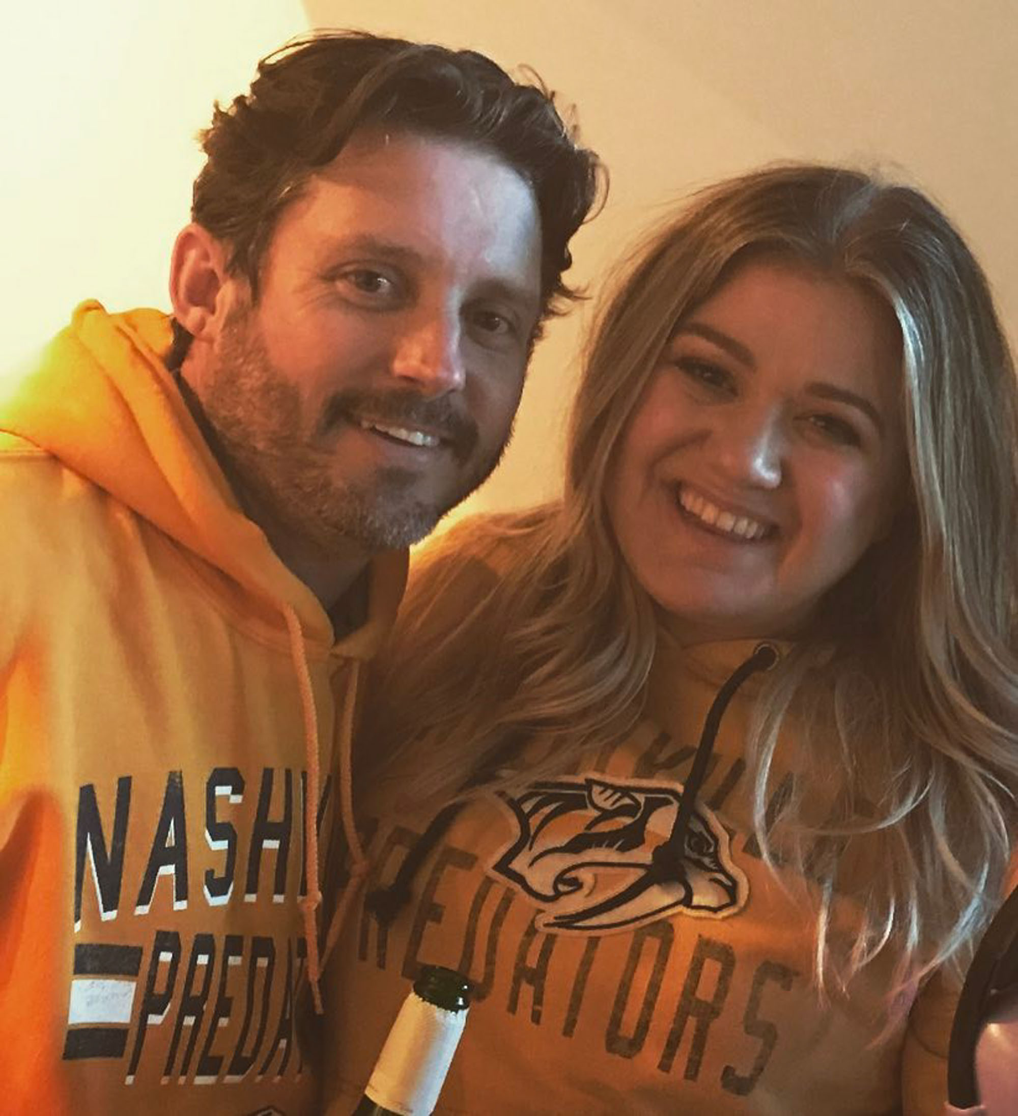 Kelly Clarkson and Brandon Blackstock smile. 