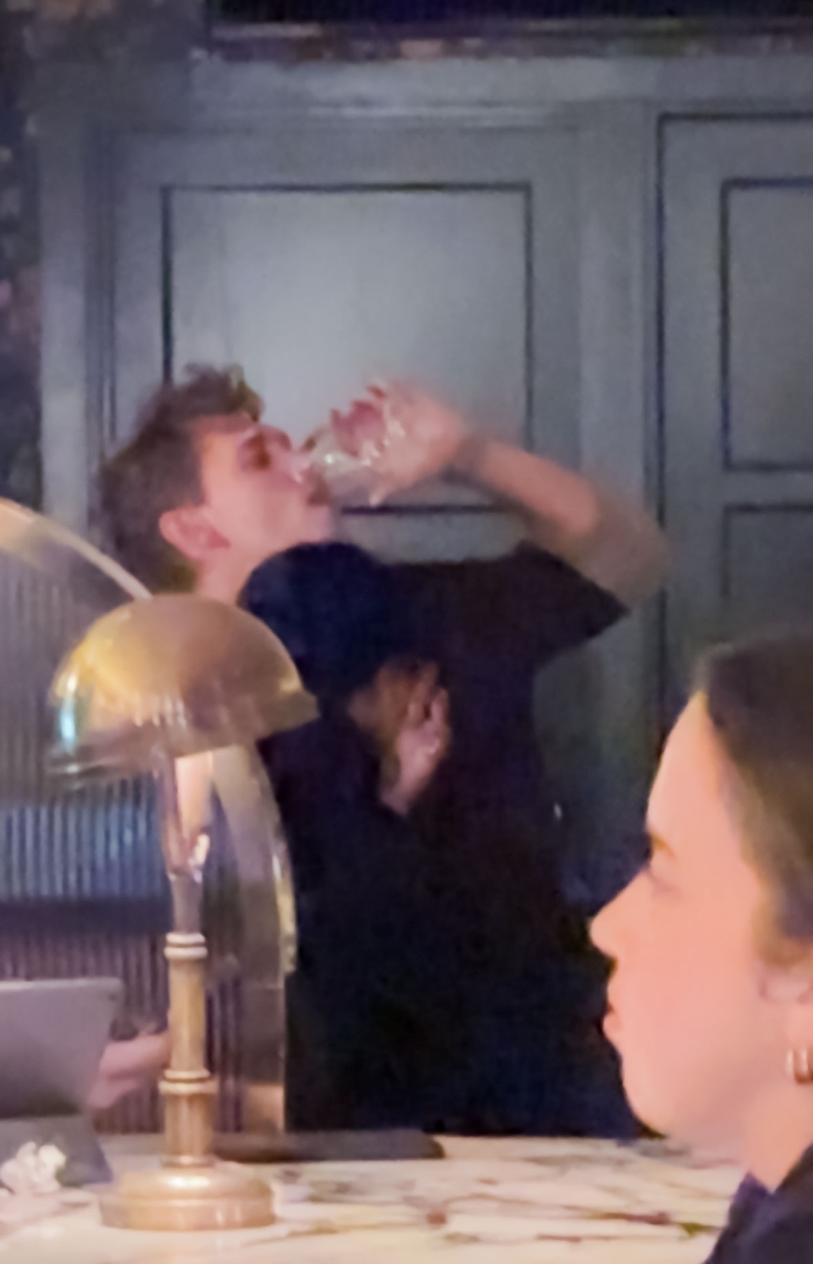 Zoe Kravitz and Austin Butler at a bar. 