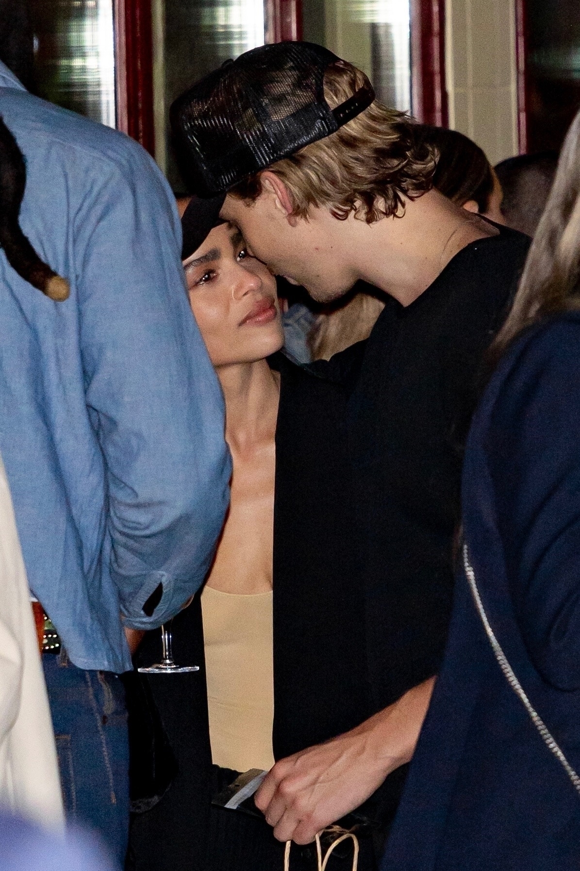 Austin Butler and Zoe Kravitz at a party. 