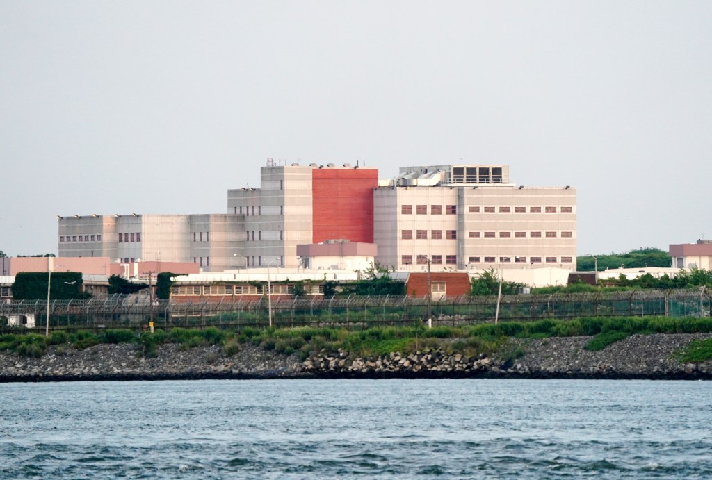 Long-range view of Rikers Island jail complex.