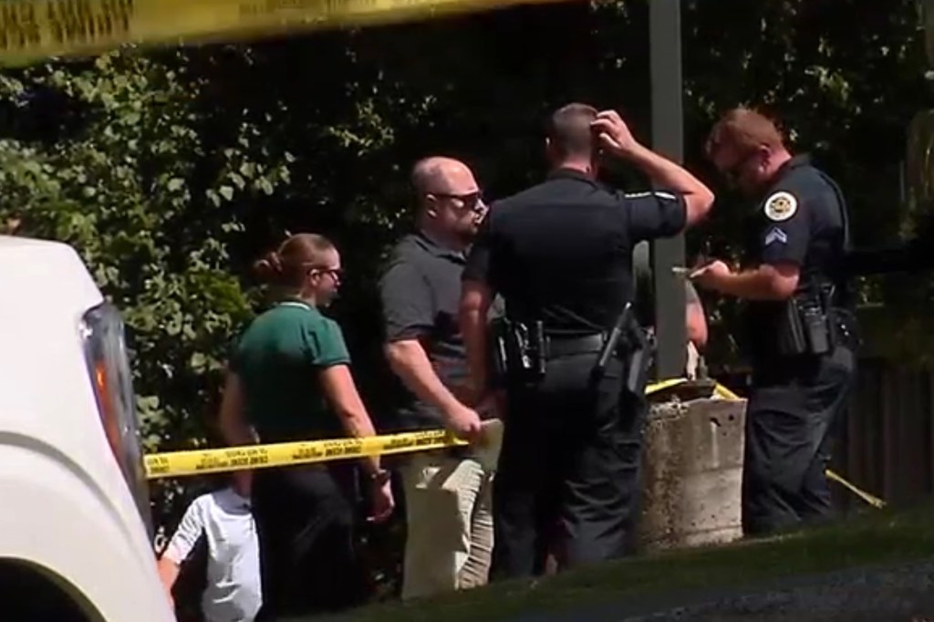 Police officers at a crime scene.