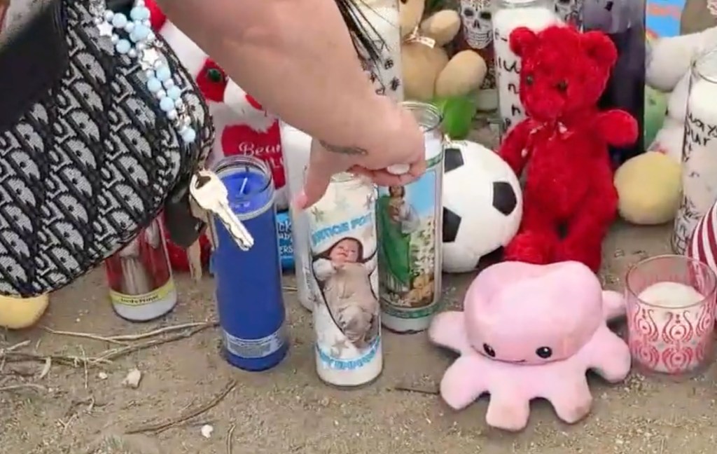 Candles and stuffed animals at a vigil for baby Emmanuel Haro on Aug. 22, 2025