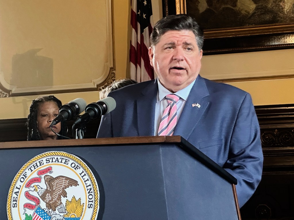Illinois Gov. JB Pritzker speaks to reporters at the state Capitol in Springfield, Ill. on Aug. 12, 2025.